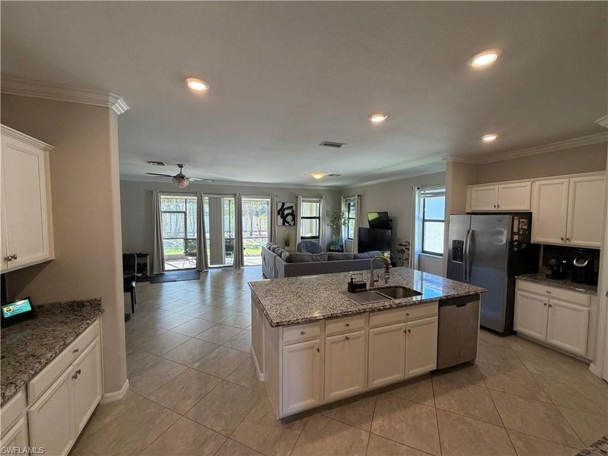 Annual rental available in the gated Raffia Preserve community. This 2018 built single family home features 3 bedrooms plus a den and 3 full bathrooms, offering a flexible layout ideal for long term tenants. The open great room floorplan provides comfortable everyday living.

The primary suite includes dual sinks, a soaking tub, walk in shower, and two walk in closets. Tile flooring runs throughout the main living areas, and the kitchen features upgraded cabinetry, stainless steel appliances, pantry, and ample storage. Laundry room includes a utility sink. Screened lanai overlooks a nicely landscaped area.

Conveniently located within walking distance to the newly updated Founders Square, offering a wide variety of restaurants, coffee shops, and retail. Raffia Preserve is a gated community with resort style amenities including a clubhouse, community pool, fitness center, basketball courts, and social room. Annual lease only.