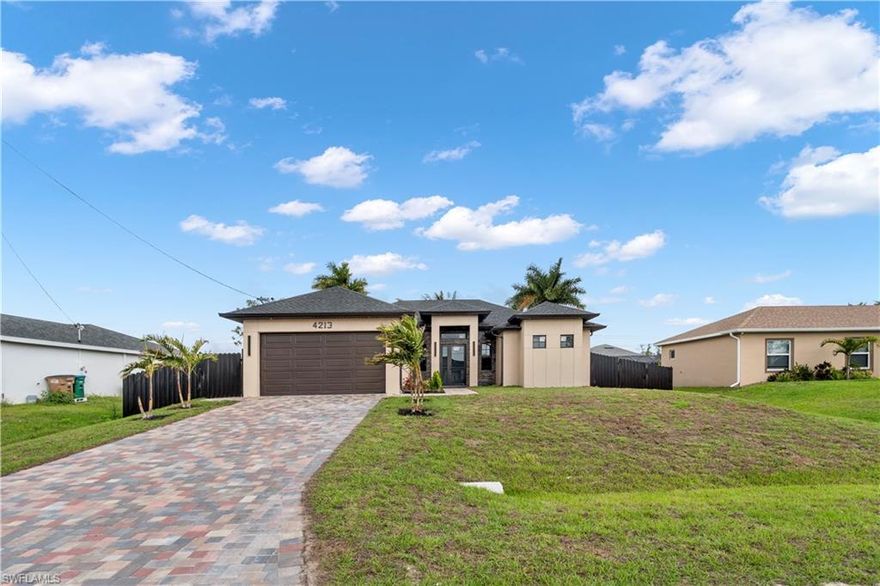 Welcome to this newly constructed home in Northeast Cape Coral. Located in a quiet neighborhood, this beautiful property features an open layout with three bedrooms and two bathrooms. The home is finished with quartz countertops and tile flooring throughout. Outside, you will find a private pool and a spacious lanai, perfect for relaxing or entertaining. The backyard is already fully fenced for added privacy and security. Do not miss this opportunity—schedule a viewing today. The seller is ready to review your offer!