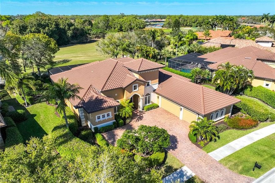 Welcome to an exceptional estate residence in the exclusive double-gated Majors at Lely Resort, where refined luxury meets effortless Florida living. This beautifully maintained Muirfield model is offered turnkey furnished and features four bedrooms plus a den, three-and-a-half baths, and an elegant, well-designed layout ideal for both everyday comfort and grand entertaining.  From the moment you arrive, the home makes a statement with its custom double-door entry, opening to a light-filled interior enhanced by crown molding, custom plantation shutters throughout, upgraded granite countertops, stainless steel appliances, and fresh interior and exterior paint. Recent improvements also include a newer tile roof, updated HVAC systems, water heater, and a fully resurfaced pool and spa, reflecting meticulous care and pride of ownership. The open-concept floor plan flows seamlessly, anchored by a gourmet kitchen with walk-in pantry, generous cabinetry, and expansive gathering spaces designed to host with ease. Step outside to an outstanding outdoor living retreat, where a sun-drenched deck surrounds a heated pool and integrated spa, all set against long, private western sunset views overlooking the golf course—a perfect backdrop for evening relaxation or entertaining guests.  Additional highlights include a three-car garage with ample storage, enhanced landscaping for a clean, polished aesthetic, and immediate access to The Players Club & Spa, offering resort-style pools, dining, tiki bar and grill, full-service spa, fitness center, billiards room, and premier tennis and pickleball facilities. Golf enthusiasts will appreciate Lely Resort’s three championship 18-hole courses, making this community truly unmatched.  This is a rare opportunity to own a move-in-ready estate home in one of Naples’ most sought-after resort communities—where luxury, lifestyle, and convenience come together beautifully.