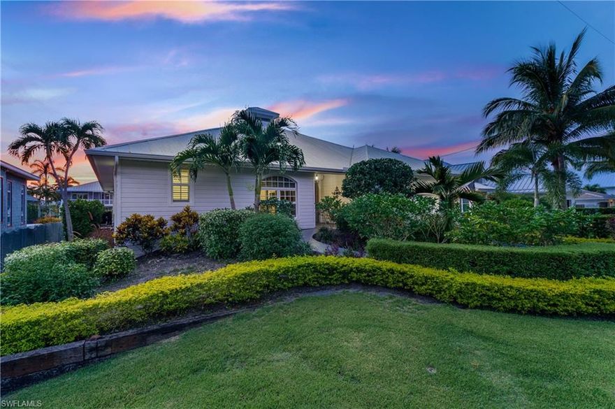 Lives like brand new construction!! Complete renovation on this stunning waterfront property. Home offers an immediate water/pool view as you enter large oak front doors. Walk into a large open floor-plan with vaulted tray ceilings & new Cabana Sand Italian ceramic tile flooring throughout the entire house. Brand new kitchen upgrades include White Glacier countertops, white cabinetry-to ceiling w glass fronts, new gas stove/gas range, new hood over range, new microwave installed into large island 8ft X 5ft, white/grey Granite Countertops, & dark grey cabinetry. Set foot into your new master bedroom suite with massive walk-in custom closets. Master bath upgrades include white/grey granite, White Shaker Cabinets, new stand-alone tub, Brush nickel fixtures, etc. Enjoy the sun-drenched back lanai with a heated pool & waterfall feature. Huge outdoor living space with lemon/orange trees. Boaters will appreciate the like-new boat dock/lift & quick no-bridge access to Naples Bay & Gulf of Mexico. Within a couple of miles to 5th Avenue South for shopping/fine dining & Naples white sandy beaches. Don't miss your chance to live in one of Naples most desirable waterfront communities