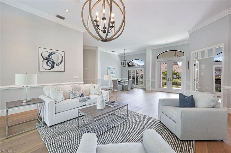 Your serene, idyllic dream home in the heart of Pelican Bay awaits you! You will fall in love with every detail of this expansive three-bedroom-plus-den residence. Each room flows seamlessly and is complete with gorgeous volume and vaulted ceilings, skylights, crown molding and surround sound. Your stunning, spacious kitchen features granite countertops, a gas stove and 2022 stainless steel appliances. Your oversized screened-in outdoor oasis offers a breathtaking pool with spa and stunning waterfall feature. The beautiful new updates are endless, from 2023 impact hurricane windows and doors to the Legno Bastone hardwood flooring found throughout this lovely home. This residence also has a generous two-car garage complete with air conditioning, ample closet storage and new epoxy flooring. Just a short distance to some of Naples’ best destinations including Waterside Shops, the Baker Museum and Artis—Naples. Pelican Bay features 3 miles of pristine private beach access and two beach restaurants, a full fitness center and spa, two tennis facilities, and complimentary canoeing, kayaking and sailing. Club Pelican Bay offers 27 holes of golf, separate membership required.