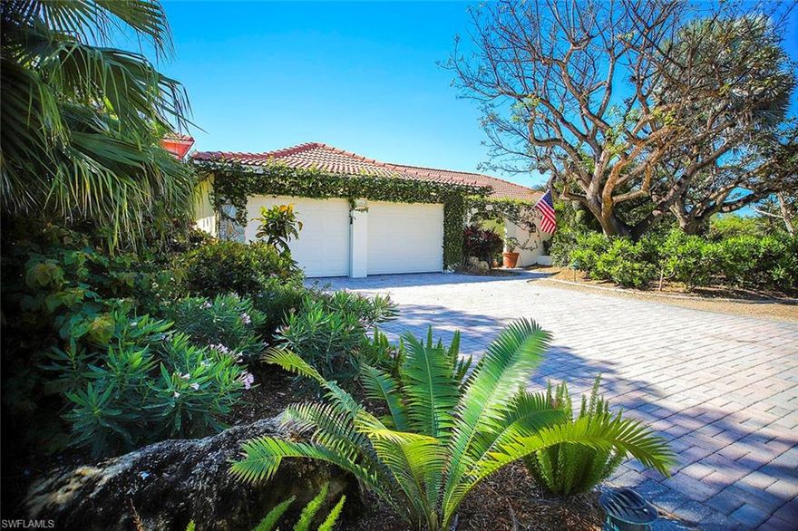 One of the largest near beach homes on Sanibel! This charming ground level home is located on a Double Lakefront lot. 5 bedroom plus office or den, 5 bath with beautiful views of the water and a near beach location. The large screened lanai off of the living/dining room and the family room offers a large heated pool and an outdoor kitchen area for entertaining. The screened lanai opens out to the beautiful garden and large lawn overlooking the lake. The master bedroom has a separate screened in porch with a heated spa lakeside and the upstairs bedroom has an open porch also with views of the water. There are 3bedrooms down - 2 en suite. The master has a large walk in closet and spacious master bath and the 3rd guest room downstairs as well as the office/den has the bath immediately adjacent. This home is light and bright throughout and has been meticulously maintained by the owners. A must see for those families looking for space, the beach and beautiful views.