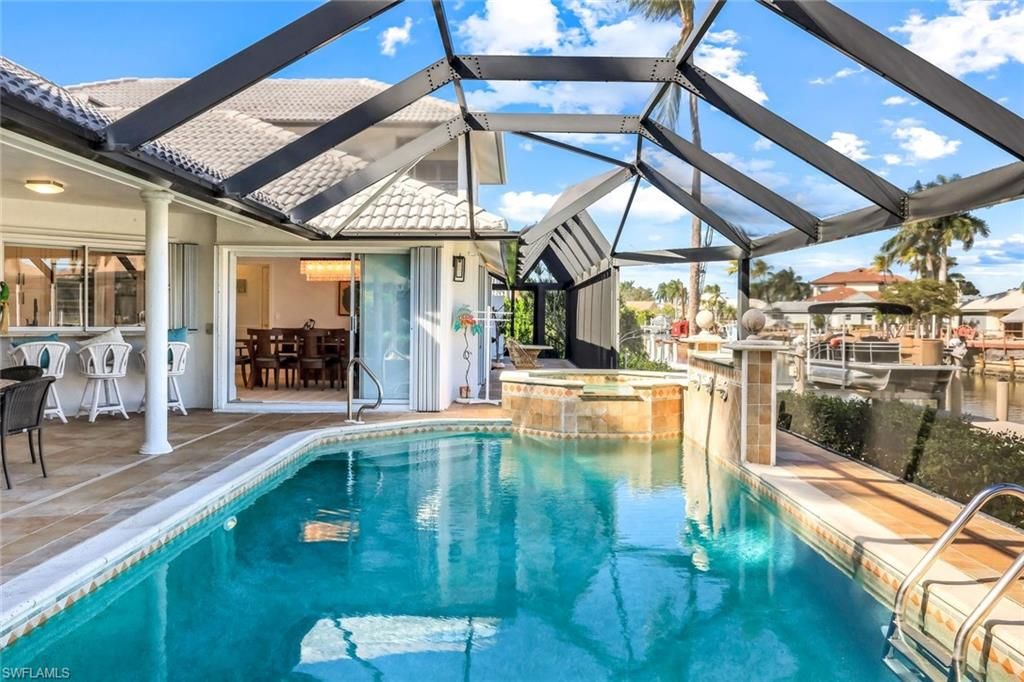 Photo of 147 Dan River CT, MARCO ISLAND, FL 34145 (MLS # 225084036)