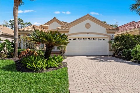 Photo of 9234 Troon Lakes DR, NAPLES, FL 34109 (MLS # 225020265)