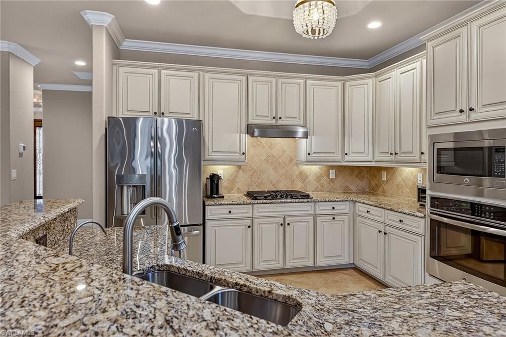 Photo of 2898 Aviamar CIR, NAPLES, FL 34114 (MLS # 226010804)