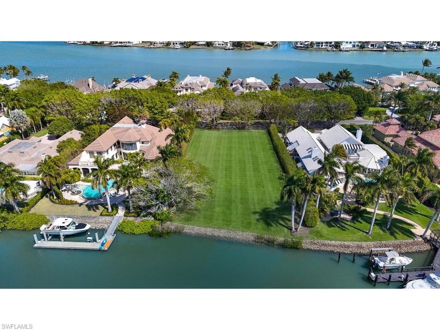 Positioned along the tree-lined serenity of Galleon Drive, this exceptional homesite captures rare and highly sought-after southwest exposure over Runaway Bay. With approximately 112 feet of water frontage as per plat and/or deed, the property boasts a commanding shoreline presence and extraordinary depth, creating a generous building envelope while allowing for spacious gardens and exceptional outdoor living environments. Enjoy bridge-free access to the Gulf and Naples’ scenic inland waterways, along with membership eligibility to the Port Royal Club. A rare opportunity to create a distinguished waterfront residence in one of Naples’ most exclusive settings.