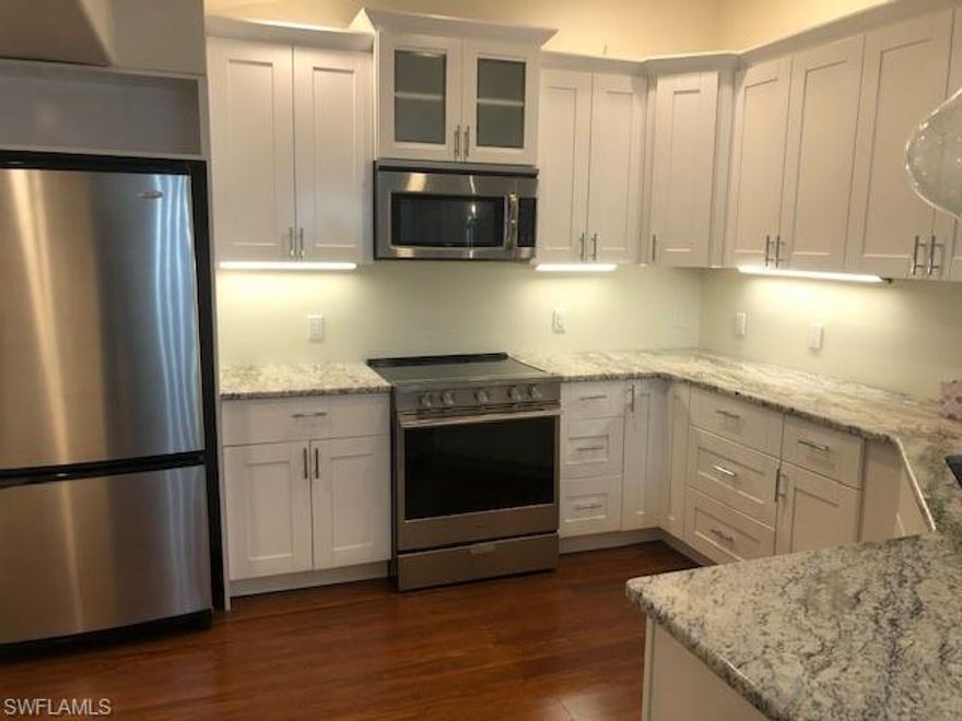 Completely remodeled 3 Bedroom 2 Bath POOL HOME with BRAND NEW AC and a roof done in 2016!! Fenced Yard and LARGE SHED for a workshop/she-shed/man-cave! Wide open floor plan that is light & bright!! Kitchen has brand new soft-close cabinetry and beautiful granite countertops with stainless steel appliances!! Very modern, sleek & updated look! New solid bamboo flooring in Main living area! New carpet in bedrooms! Remodeled bathrooms with modern vanities, tile & fixtures! Large Lanai under truss - perfect for entertaining! Stamped concrete pool & lanai deck! Large pool area! This home is perfect for your entertaining and daily living needs - everything you want in SWFL living at an affordable price! Bring your offer today!