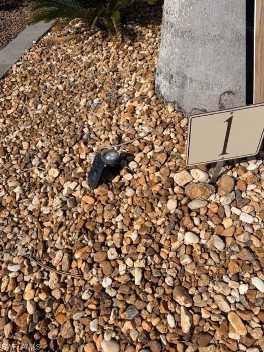 Lot number one has an all concrete pad facing South.  This lot offers loads of privacy and is surrounded by a vast variety of Landscaping to include an ACAI Palm, miniature date palms ACECA Palm, Sylvester Palms, one Cuban Royal Palms, one dwarf umbrella tree, several Caribbean, Royal Palms, a sago palm and numerous other varieties.  The Amazon shed was placed on the lot in 2015 and measures 10 x 12.  It’s presently used for storage only and it has several large windows with an 80 amp electrical box with breakers for future use.  You can remodel the shed and add a shower, toilet, sink and if interested a washer and dryer hook up.  Also featured on the lot is a 10‘ x 20‘ Tiki Hut that was added for some nice shade during the day.   The side yard features some small tan stones as well as some grass that will be maintained by the HOA.  Make this lot your number one and your Florida home.