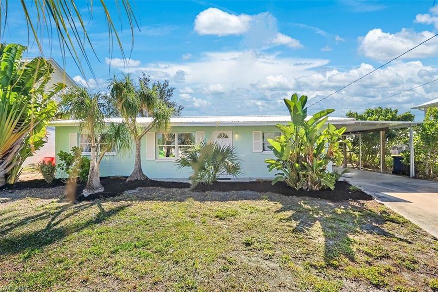 Skip the Renovation—This One’s Already Done | Gulf Access, No Bridges!  Positioned on an extra-wide canal lot in Estero Bay Shores, this completely rebuilt waterfront home delivers the kind of access buyers are actively searching for—direct Gulf access with no bridges and a fast run out to open water.

This is not a typical renovation. The property has been taken down to the studs and rebuilt, offering the confidence of modern systems throughout. Major components—including electrical, plumbing, HVAC, ductwork, water heater, and a metal roof—have all been replaced, providing long-term reliability and reduced near-term maintenance.

The concrete block structure anchors the home, while natural light fills the interior, creating a bright, open feel that complements the waterfront setting.

The kitchen is clean and functional with brand-new appliances, and the inclusion of a washer and dryer adds immediate livability. A screened lanai extends the living space outdoors, overlooking the fenced backyard and canal—ideal for both everyday use and entertaining.

Outside, the property is set up for waterfront living. The private dock allows for easy boating access, whether heading out for the day or enjoying sunset views right from your backyard. The fenced yard adds flexibility for pets, storage, or outdoor activities.

Located in a neighborhood experiencing continued growth, with newer construction nearby, this property offers a balance of established waterfront living and ongoing area improvement.

If direct access, updated construction, and a usable waterfront layout are priorities, this property checks the right boxes.