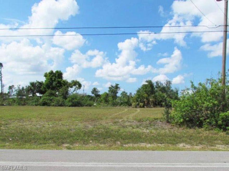 This is it!  Build your dream home on this highly desirable freshwater canal lot with public water and sewer.   Enjoy fishing from your own backyard or just relax and watch the sunset in your own slice of paradise.   A quiet neighborhood with Southern exposure in a fast growing Cape Coral Area.   GREAT LOCATION (near the corner of SANTA BARBARA BLVD & PINE ISLAND RD).   Close to schools, restaurants, shopping, golf, boating, beaches and a quick commute to the Punta Gorda or Fort Myers airport.  Enjoy Florida's perfect climate and start living your best life.