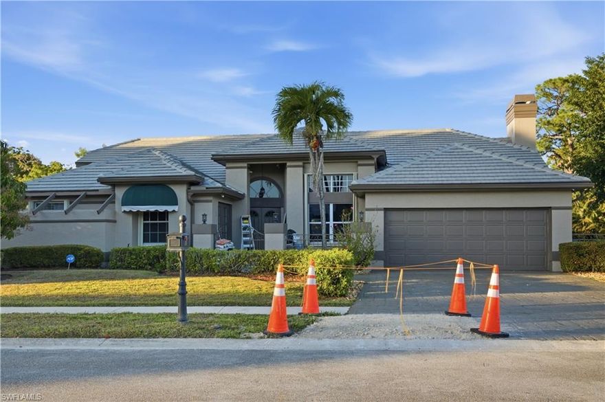 Located in the private gated community of Carillon Woods, this spacious 3,031 sq. ft. estate offers 3 bedrooms plus a den and 2.5 bathrooms, providing a large-scale layout in a prime Fort Myers location. Perfect for a home business or remote work, the den/office features its own private entrance. The home offers a paved driveway and significant peace of mind with a new tile roof (2016), completely redone plumbing (2019), and a freshly painted interior (2026). The kitchen is equipped with granite countertops, a reverse osmosis water system, and plentiful cabinetry, while the split-bedroom floor plan ensures maximum privacy. Step outside to a private backyard oasis featuring a lake view, an oversized screened-in lanai with a private in-ground pool, and a built-in outdoor kitchen. The tropical grounds are highlighted by majestic, mature mango trees. Complete with a two-car garage, this home is positioned just minutes from Gulf Coast Town Center and the world-renowned beaches of Sanibel and Captiva Islands.