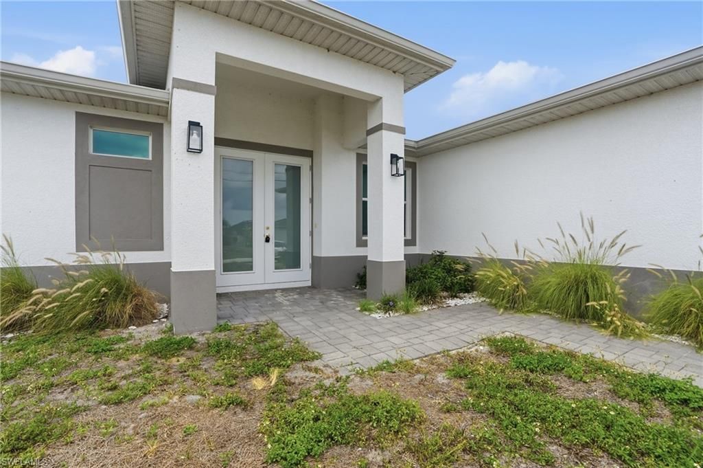 Photo of 326 NE 20th TER, CAPE CORAL, FL 33909 (MLS # 226019161)