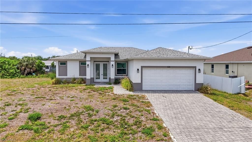 Photo of 326 NE 20th TER, CAPE CORAL, FL 33909 (MLS # 226019161)