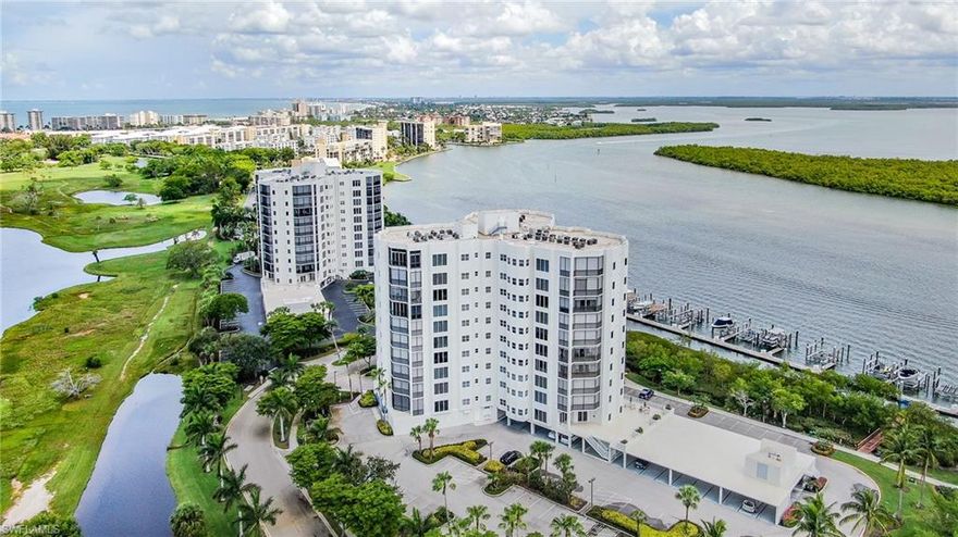 UNPARALLELED  VIEWS OF ESTERO BAY. VIEWS OF POOL, GOLF COURSE & GULF OF MEXICO TO THE SOUTH. Gorgeous wood cabinets, unique Fixtures and wall treatments. Amber glass tile backsplash and granite counter tops with stainless steel appliances. Designer Master Bath w/panoramic views! Porcelain tile flooring in living area. Electric Storm Shutters on lanai. Watch the dolphins & manatees from your living room, bedroom, master bath and lanai! Waterside has a luxury gated community with beach access and parking near by. Amenities incluyde pool/spa, fitness & social rooms, sauna's, guest suites, tennis courts, fishing pier, jog path and walk to shops, restaurants and golf course! Railings are new. No structural damage from hurricane Ian. Pool is been redone and no assessment coming up. Owner has a deep water dock / lift 12,000LB available only with unit at $80,000.00