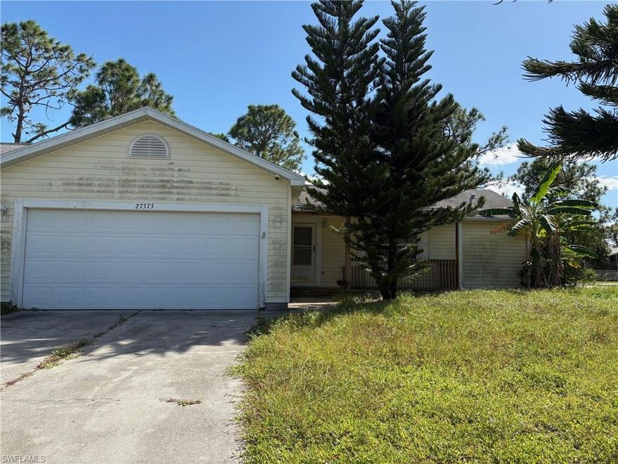 FORECLOSED PROPERTY.   Single family home that comes with an additional adjacent lot that connects from the left side of the backyard,  perfect to build a mother in law apartment.   House sits on a corner lot, and offers 3 bedroom, 2 bath, inside laundry and 2 car garage.   Immediate access to US-41 and easy commute to North Fort Myers and Port Charlotte.