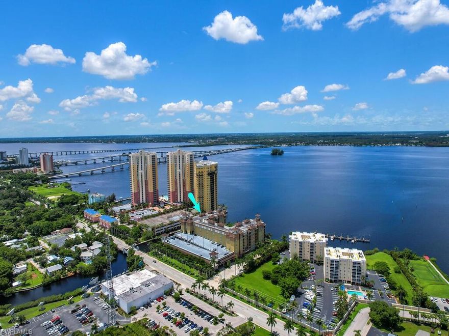 Do you want waterfront resort life in SW Florida?  Come see this beautiful waterfront condo at Alta Mar in downtown Fort Myers.  This 2 Bed/2.5 Bath condo on the first floor with a balcony that looks out to side canal and partial river view.  Open concept kitchen with granite countertops and a rolling island.  Both bedrooms have own spacious bathrooms with walk in closets.  Master has private door to patio and a shower and garden tub combo.  Lots of amenities with a zero-entry pool that looks out to the Caloosahatchee, fitness center, outdoor BBQ, community rooms, bike storage and much much more.  Schedule a showing today.  This won't last long!!!