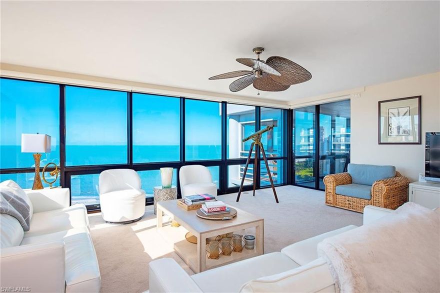 From the moment you enter this three bedroom two bath penthouse in Parkshore. You'll be captivated by the panoramic views of the Gulf and endless sunsets beyond. An open floorplan with floor to floor-to-ceiling windows showcase the Gulf from nearly every room,  creating a breathtaking drop day and night. You will enjoy unforgettable sunsets from your 40 foot lanai as you hear the waves roll in. The living room area and primary bedroom suite open directly to the lanai, an updated eat-in -kitchen with and baths and is offered turnkey furnished. Just bring your suitcase, beachfront living walking distance to Venetian Village and waterside boat slips across the street pet pet-friendly building with 24-hour security,  guest suites, social room, fire pit, fitness center, and gorgeous pool!