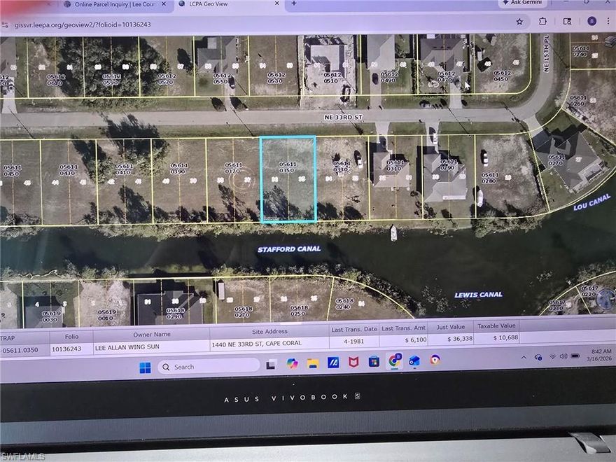 Residential Vacant Waterfront Lot on the Stafford Canal in the Gator Circle area of Cape Coral FL. Although the pictures show clouds due to rain starting, there is plenty of sunshine in this area! This canal is 80' wide and has several homes near it but not immediately beside it.  The canal is on the south side of the lot so you will have a water view in your back yard.   Build your favorite floor plan right here!