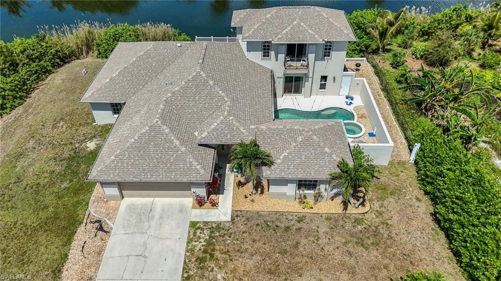 Photo of 2534 NE 20th CT, CAPE CORAL, FL 33909 (MLS # 226017398)
