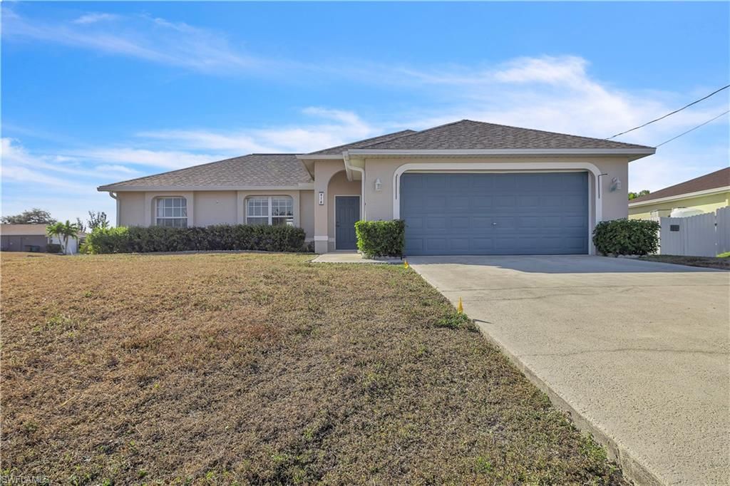Photo of 916 NE 4th PL, CAPE CORAL, FL 33909 (MLS # 226005851)