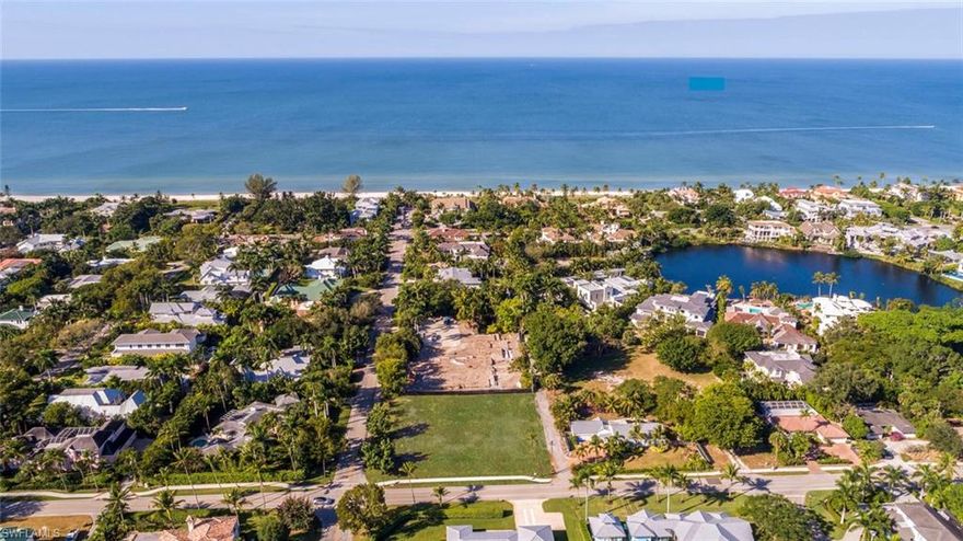 L.2198 - Beautiful homesite is over 1/2 acre, just 2 blocks from the Olde Naples beach! Build your dream home on this oversized 150' x 153' lot with the flexibility to have your home facing south, as 265 4th Ave N. or facing 3rd St. The older home has already been removed so you can start fresh with your new home design. See concept home renderings created by renowned architect John Cooney of Stofft Cooney Architects, which features the ideal Florida lifestyle home with over 5000 sq ft living area, a three car garage and a western exposure pool. Additionally, you have the benefit of a back alley at the north side of the lot, for garage or guest quarters access. A well-priced, gorgeous lot in an exceptional neighborhood! Live the Olde Naples dream! 
(Note: Realist has the incorrect address, but Collier Appraiser has correct, 4th AVE N)