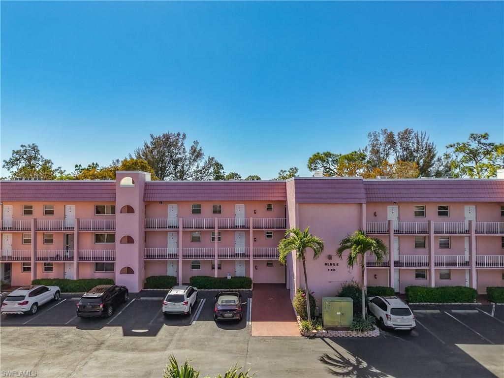 Photo of 180 TURTLE LAKE CT #206, NAPLES, FL 34105 (MLS # 226013251)