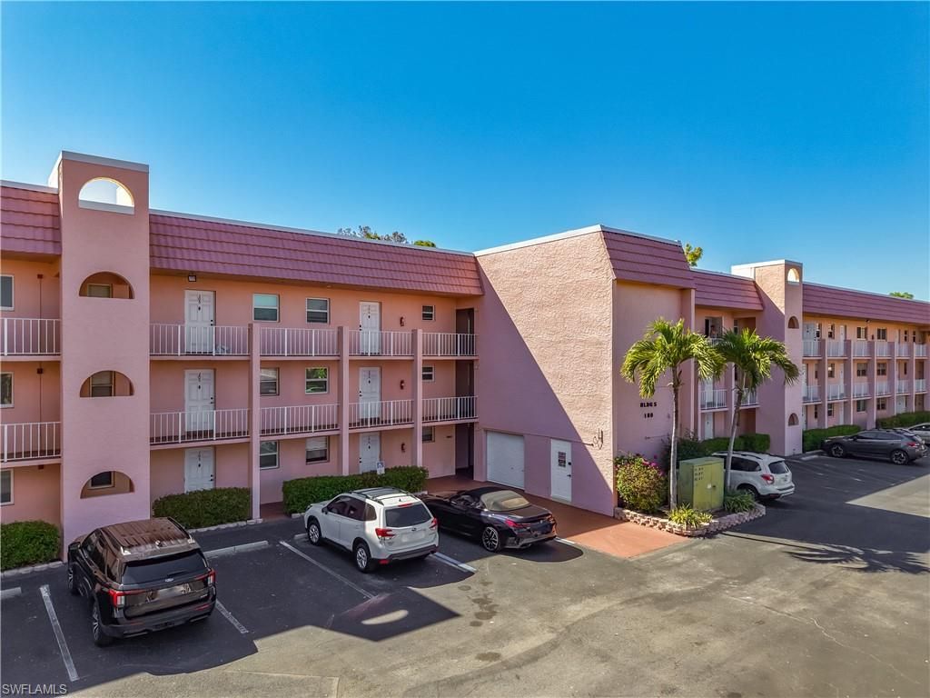 Photo of 180 TURTLE LAKE CT #206, NAPLES, FL 34105 (MLS # 226013251)