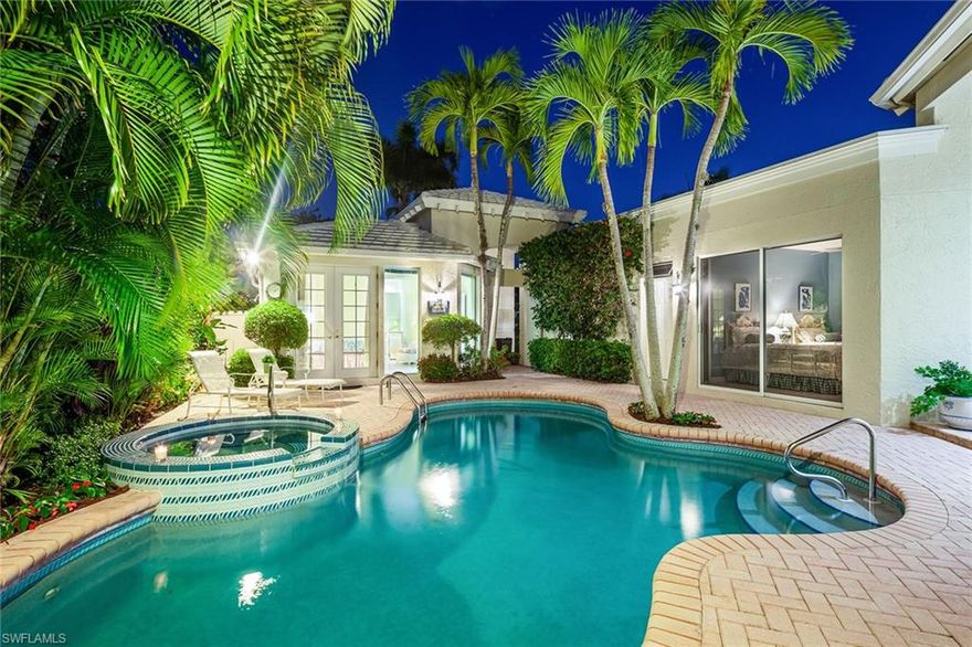 Charming, private Grand Bay Villa in the heart of Pelican Bay offers southern exposure with fabulous, sunny living space for the most discerning homeowner.  With its signature new sunroom with white oak ceilings and beams with fabulous built-ins opening to charming patio overlooking the lake, this home offers elegant living space for a large crowd, full time or part time! Meticulous condition and bright and light, neutral interiors make this home move-in ready, with each bedroom opening onto lovely outdoor space.  The sprawling living space with high ceilings throughout and great room floorplan is complemented by the fabulous cabana, complete with kitchenette and full bath.  This lovely community is an intimate grouping of homes (lawn care included) in a prime gated location in Pelican Bay with easy access to the North tram station allowing a quick trip to the famous, recently renovated Marker 36- one of Pelican Bay's two private beach clubs with dining.  The easy access to the Pelican Bay Community center, world-class tennis center and state-of-the-art fitness center completes the package.