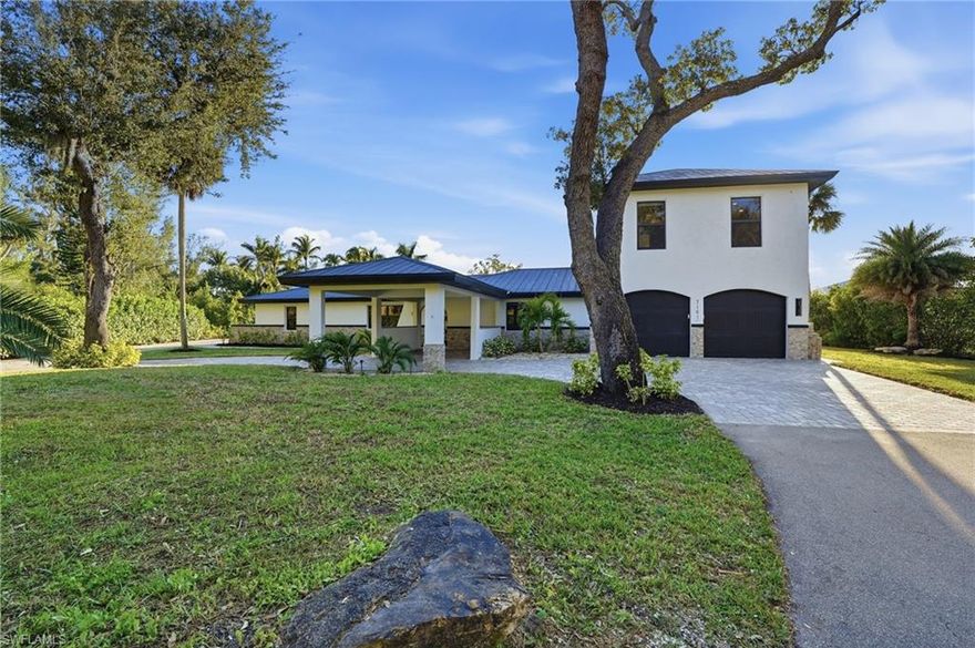 No HOA, No Rules! This fully updated 4-bedroom, 4-bathroom WATERFRONT home offers an abundance of NATURAL LIGHT (large windows & skylights), & an open-concept floor plan, w/ MODERN, yet WARM FINISHES throughout. The kitchen, equipped w/ KitchenAid appliances, real-wood cabinetry & seating at the waterfall island, seamlessly flows into the dining & living areas- perfect for entertaining. The large primary suite includes two custom closets & a spa-style ensuite bathroom w/ a freestanding tub, oversized glass-enclosed shower, & dual vanities. Each additional bedroom has its own bathroom. In your large backyard, you have a resort-style outdoor entertaining space with a LARGE POOL (w/ water features), an expansive paver deck, and lush landscaping that creates privacy. Water views can be enjoyed from the backyard (& most rooms of the home). Keep your boat at the property on the new dock+lift, & be out to the GULF in just a short boat-ride. Additional upgrades made to the home include: 2026 hot water heater, whole-home reverse osmosis water system, 2024 AC, impact glass protection, RV parking/hookup. Located on a quiet dead-end cul-de-sac, this home offers a rare opportunity to have land, no strict HOA rules, & seclusion, yet all in the heart of Fort Myers- just a stone’s throw from RSW International Airport, beaches, world-class shopping, & some of the best restaurants in SWFL.
