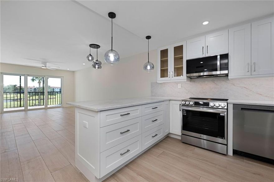 Immediate bundled golf memberships, totally renovated and move-in ready! High Point Country Club is located off US-41, across from Park Shore, in the Heart of Naples. Completely renewed, with modern finishes, this second-floor two bedroom, two bathroom condo offers more than most. Relax on the lanai with golf course, lake and pool views, featuring all new wood-like tile throughout, white cabinetry, quartz countertops, stainless steel appliances, dry bar with wine refrigerator, impact windows and sliders, separate storage unit on the same floor, one carport and plenty of guest parking. Amenities include two golf memberships, use of six pools, clubhouse with exercise room, restaurant, pro shop, pickleball, tennis and tons of social activities. High Point Country Club is close to everything! Beaches, dining, shopping, healthcare, entertainment and more, PLUS total relaxation is within your reach!