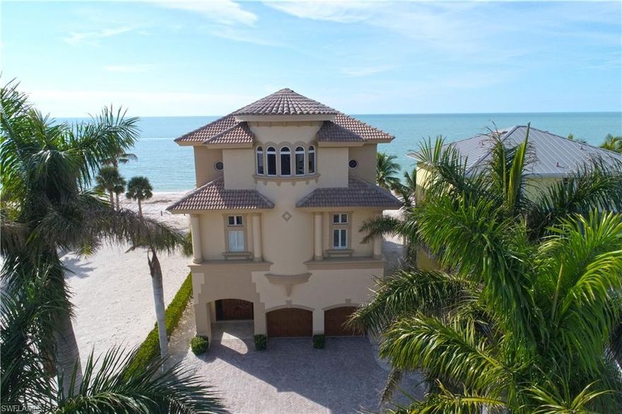 Incredible views are featured from this direct Gulf front home on Bonita Beach! This home offers fine quality and detail including granite countertops, hardwood, marble and tile flooring throughout, quality kitchen appliances, custom cabinetry, crown molding and ceiling detail, private elevator, double laundry rooms, concrete construction, electric shutters, impact glass, and electric security gate. Fantastic location on the south end of Little Hickory Island.  Close to shopping and restaurants!