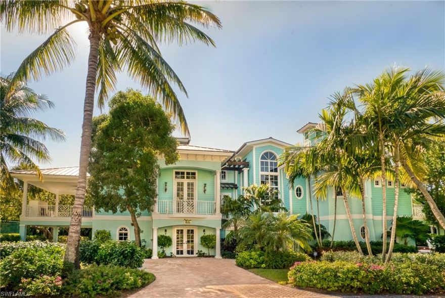 Exceptionally well constructed and beautifully maintained, this home is the ultimate tropical oasis on over an acre with its own cascading waterfall directly across from the pristine Captiva beachfront showcasing the stunning views over the azure Gulf waters, extraordinary sunsets and deep water access with lift on Roosevelt. Among the countless benefits this home includes 5 car garage, whole home generator, 5 air conditioners and a billiard room with expansive bayside deck featuring an outdoor fireplace. The pleasing tropical color scheme flows beautifully throughout and the appointments are outstanding with superb attention to detail. Built like a modern day fortress with poured concrete flooring, tie-beams and pilings. If you have been searching for a gulf front home with boating access, newer construction and the amenities of a resort, you have arrived. Furnishing negotiable.