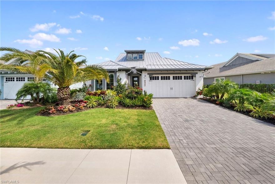 This majestic home with LUXURY UPGRADES GALORE and beautiful decor will sure impress you as soon as you will walk in through the front door. TRULY EXCEPTIONAL 2024-built WATERFRONT residence featuring the highly sought-after WISTERIA floor plan, offering 3 bedrooms plus a den, 2.5 bathrooms, and an unmatched blend of modern design, quality construction, and serene lakefront living. Very lightly lived in, this home shows like new and has been thoughtfully upgraded well beyond builder standards.
Inside, you’ll find a bright, open layout with tile flooring throughout, creating a seamless and sophisticated look. At the heart of the home is an exceptional chef’s dream kitchen, complete with a beautiful oversized island, ample cabinetry, top of the line appliances, and a layout designed for both everyday living and effortless entertaining. The spacious den provides flexibility for a home office, media room, or additional guest space.
Built for durability and peace of mind, the home features a metal roof along with impact-resistant windows and doors, offering both safety and energy efficiency. Beautiful crown molding in every room, designer light fixtures, elegant Hunter Douglas window treatments will impress even the pickiest buyers. Laundry room is complete with cabinets to keep you organized and utility sink.
Step outside to enjoy tranquil lake views, enhanced by professionally designed landscaping and outdoor lighting totaling $25,000—perfect for relaxing evenings or hosting guests in a stunning setting.
The seller has also contracted for a brand-new saltwater pool and spa, giving buyers the option to enjoy a fully customized outdoor oasis. For those who prefer not to include the pool and spa, the property is available at $1,729,000. With its premium lot, extensive upgrades, and like-new condition, this highly desirable Wisteria floor plan stands out as one of the finest opportunities in the community.
Feel like you are on vacation with resort style amenities in this lively extremely desirable community. Short walk to Cypress Waterway and beautiful NATURE TRAILS. Isles of Collier Preserve has it all! Lakeside dining at the Overlook Bar & Grill, 2 pools, even a dog park. You can stay in shape playing tennis, pickleball, bocce ball, swimming laps, working out in the fitness center, hiking and biking on 7+ miles of trails, paddle boarding, kayaking on the Cypress Waterway. If you are looking for a larger boating experience, The Isles adjoins Hamilton Harbor, a magnificent marina and club located right on Naples Bay! This exclusive community is only minutes away from historic downtown and gorgeous Naples beaches.