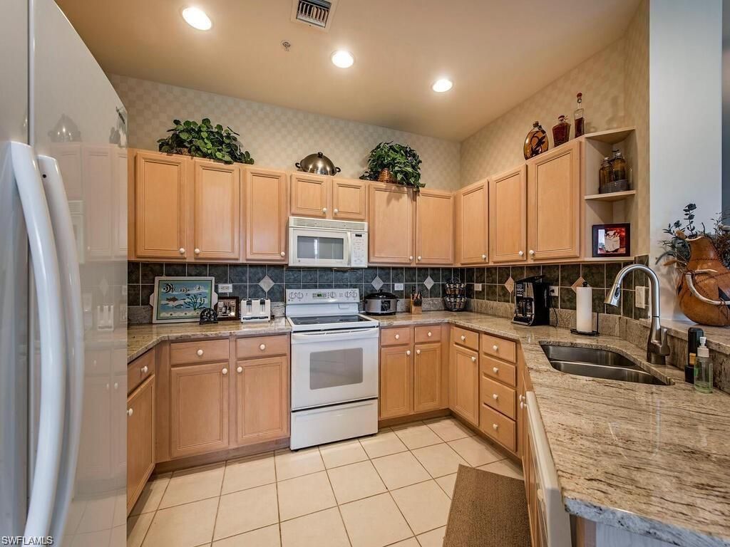 Photo of 8225 Danbury BLVD E #1-102, NAPLES, FL 34120 (MLS # 226005492)