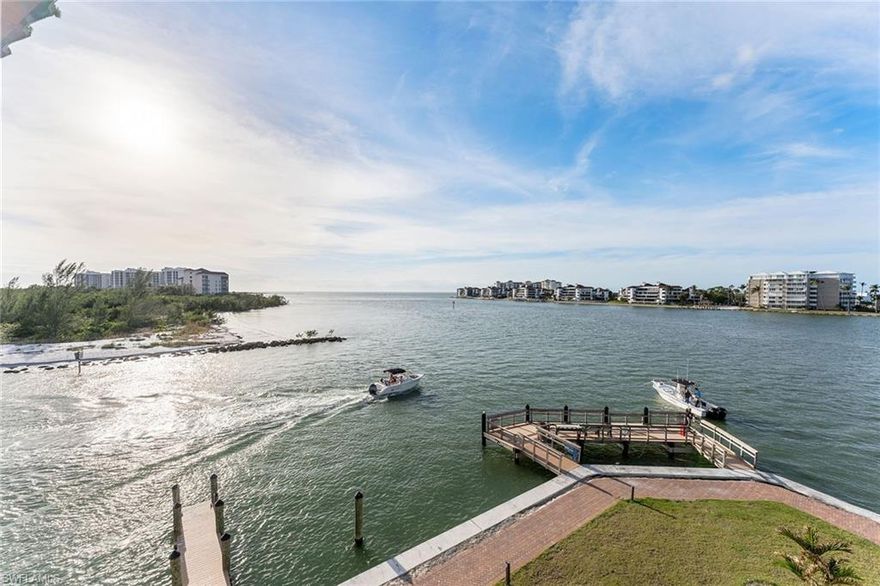 Completely Renovated! This exquisite three-bedroom, three-bath penthouse redefines coastal luxury, offering breathtaking panoramic views of the Gulf of Mexico where dolphins play and sunsets captivate. Every detail of this residence has been thoughtfully curated, from the timeless travertine flooring to the fully upgraded bedrooms with ensuites, each a private retreat of comfort and elegance. The kitchen, featuring an induction stove and modern finishes, is a chef's dream, blending functionality with sophisticated design. Offered fully furnished, this penthouse is move-in ready, making it the ideal coastal escape. Adding to its allure, the property comes complete with a private boat slip, ideal for exploring the surrounding waters or enjoying direct access to world-class fishing and boating. This home is more than just a residence. It's a lifestyle of effortless elegance, where every day feels like a vacation in paradise.