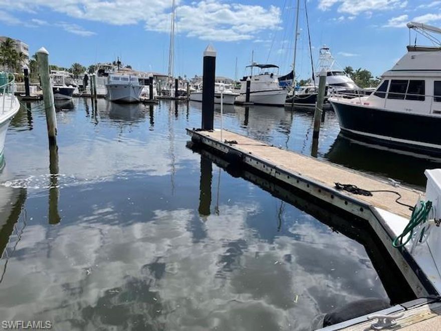 38' H-18 will accommodate a boat up to 40'10" with approved variance, maximum beam is 14'1", Condo Assoc fee $498 a month and includes use of the Marina Center, $150 appl fee once, non-residents pay $286 annually to the Master Association for community access. Concrete floating docks with electricity, water, pump out near each slip, a fuel dock with gas and diesel, laundry, showers and full time staff 7 days a week. Most of the stated beam width has been measured by marina staff but some of the beam width have not been measured so the developer numbers are stated. The Gulf Harbour Marina is actually on the Intracoastal Waterway about 5 miles to the Gulf Of Mexico.
