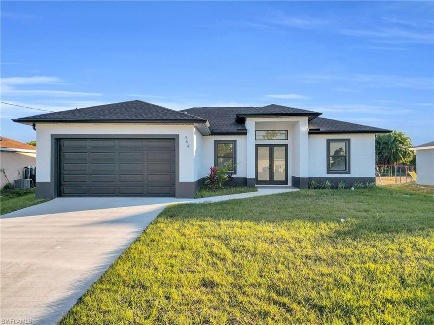 Priced to sell fast! This brand-new construction in Lehigh Acres offers 3 bedrooms + den, 2 bathrooms, with 1,630 sq ft under air and 2,230 total construction sq ft. Designed with modern elegance, featuring porcelain flooring throughout, quartz countertops, and sleek gola-style handles in the kitchen and bathrooms. Enjoy a stunning double-height ceiling that enhances natural light and creates an open, airy feel. The lanai is prepped with installation ready for an outdoor kitchen—perfect for entertaining. Situated on a desirable corner lot with extra space, ideal to park your truck, RV, or boat. Don’t miss this move-in ready home with contemporary finishes and exceptional value! *Pictures are from the same model but in different location, new pictures coming soon!*