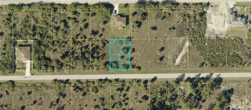 Seize this PRIME QUARTER ACRE LOT in Florida's fastest-growing city LEHIGH ACRES! This ELEVATED and DRY parcel offers a solid foundation; perfect for your future construction projects.