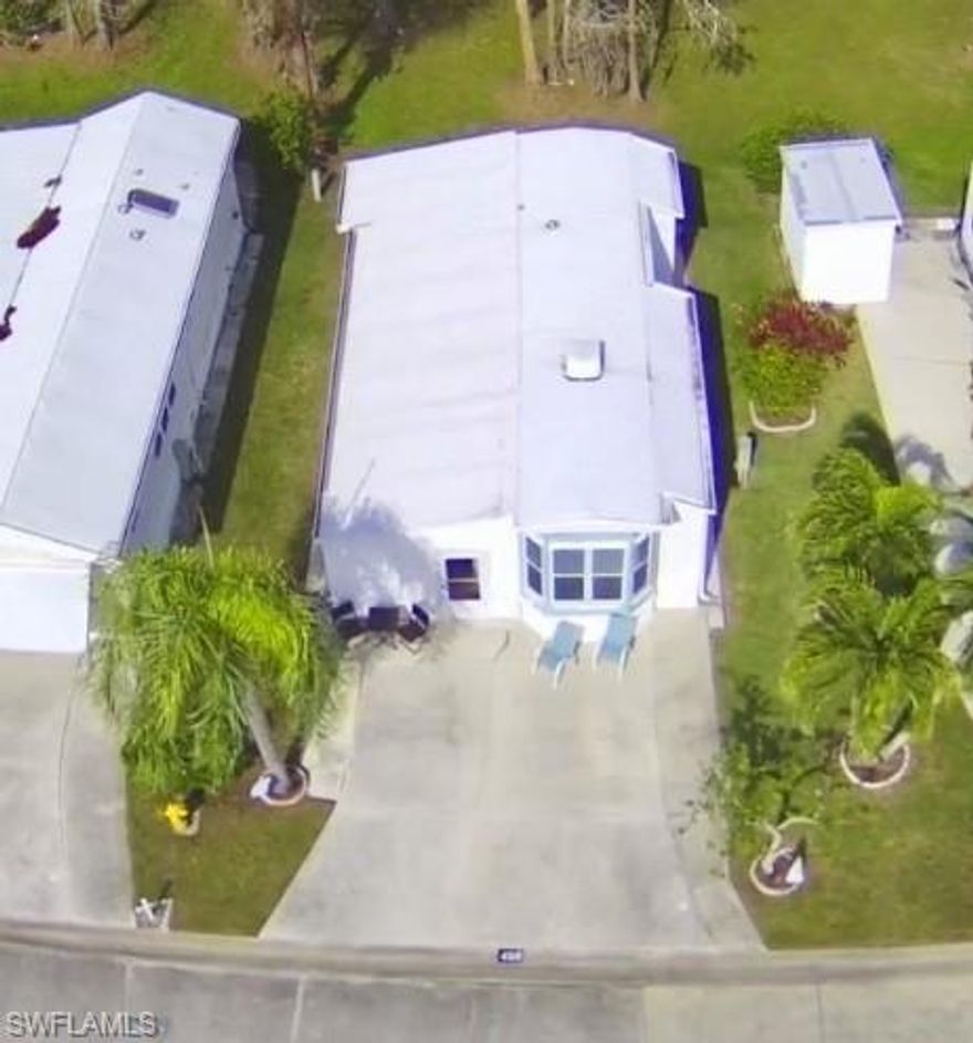 This is an outstanding opportunity to own a lot that includes an extremely well-maintained 1Br/1Ba trailer with a finished addition! Thank you for viewing 458 Vanda Sanctuary in the Imperial Wilderness Condominium Association. IWCA is a very active, gated, 55+ community in Naples, FL where you own the land. This community was never flooded or affected by any recent hurricanes. The property is scenic and the 1Br/1Ba living area is wonderfully clean and bright. The tasteful color pallets and updated laminate flooring in the unit section truly make you feel relaxed and at home. There is a cozy sitting area adjacent to the eat-in kitchen. Both areas offer plenty of natural light. The bedroom features a queen-size bed, storage, and dresser. The bathroom contains an updated (17-inch, height) toilet. In the lower level (addition area), you will appreciate a living room, additional dining space, and an area for guests to sleep. That space boasts a queen-bed and dresser. From this site, French doors exit to the side of the home. At the rear of the lower level, there is a large storage room with interior door access. On top of these features, IWCA has an exceptionally convenient location – approximately 2 miles to shopping and restaurants, 8 miles to Marco Island beaches, and 10 miles to Naples beaches. The HOA fee of $898. per quarter is very reasonable and covers many of your needs: water, lawn care, basic cable, trash/recycling, and community amenities. Community amenities include the following: 2 pools with spas, bocce, pickleball, pétanque, tennis, shuffleboard, billiards, ping pong, a library, clubhouse, nature trail, and an extremely active social events calendar. Additionally, for a fee, there is a laundry facility and a storage area (waitlist). Finally, this subdivision boasts 2 dog parks and a dog walk (1 pet 40lb. max.).