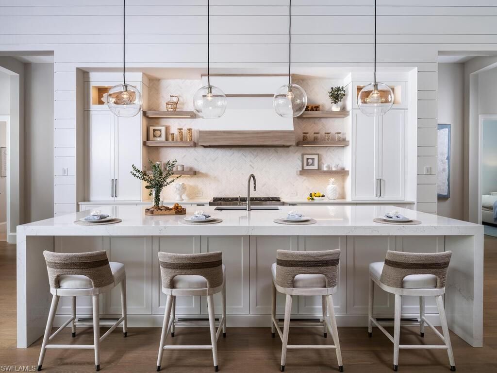 Photo of 137 Tupelo RD, NAPLES, FL 34108 (MLS # 225072251)