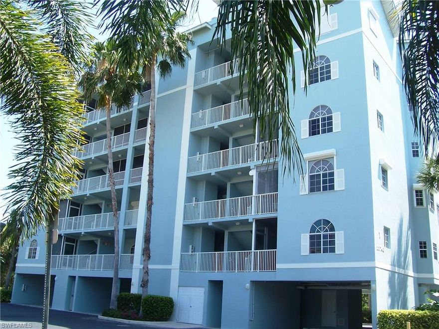 Perfect location across the street from the wide white sugar sand beach of The Gulf of Mexico.  Desirable end unit on the second floor, corner 2 bed 2 bath condo.  Plenty of light from the side windows make this condo bright & cheery.  Under building parking & a storage closet. The laundry is inside the condo with full size washer & dryer.   Relax on the lanai watching the squirrels & birds playing.  Two swimming pools & tennis court.  Beach across the street.  Walking distance to restaurants, movie theater, post office, drugstore, marina, retail shopping & convenient store.  Make this your Florida destination!