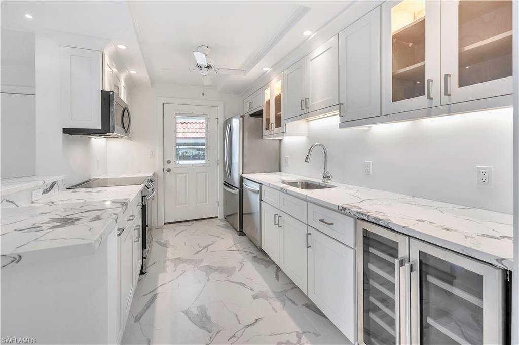 Photo of 222 Harbour DR #114, NAPLES, FL 34103 (MLS # 225058559)