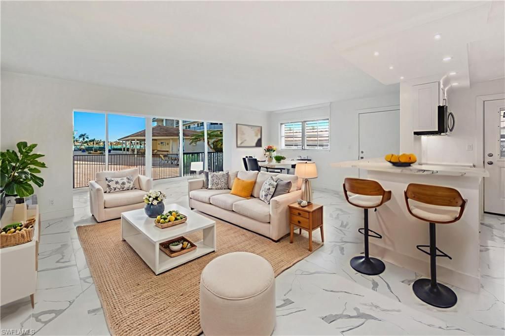 Photo of 222 Harbour DR #114, NAPLES, FL 34103 (MLS # 225058559)