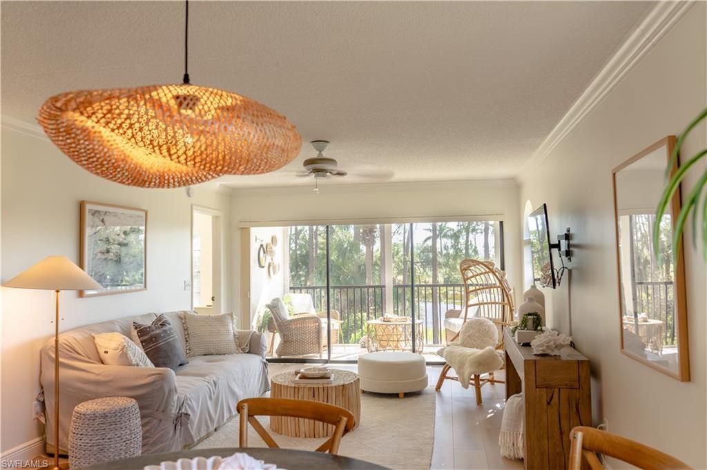Photo of 265 Deerwood CIR #10, NAPLES, FL 34113 (MLS # 226015579)