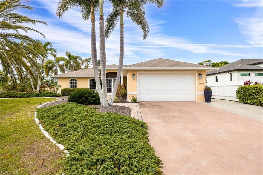 Welcome to your slice of island living in Charlotte Shores in Bokeelia! This beautifully maintained 3-bedroom, 2-bath furnished home is perfectly situated on an oversized lot, offering a bright and inviting layout with a natural flow ideal for both everyday living and entertaining and the home hasn't flooded. From the moment you step inside, you’ll appreciate the comfortable living spaces designed to capture the essence of relaxed coastal living. The main living area features a cathedral ceiling, tile flooring throughout, Natuzzi Italian leather sofa and loveseat, and sliding glass doors that open to the screened lanai—creating a seamless indoor-outdoor connection. The spacious kitchen is both functional and stylish, showcasing white beach-inspired cabinetry, ample counter space, a convenient breakfast bar, and a charming dining area perfect for gathering with family and friends. The primary suite serves as a private retreat, complete with direct access to the lanai, a Temper-Pedic adjustable bed, walk-in closet and a beautifully renovated en suite bathroom featuring dual sinks, granite countertops, LED lighted mirrors, and a step-in shower.  Two additional bedrooms and a tastefully updated guest bathroom with granite countertops and an LED mirror ensure comfort and convenience for guests. The home also includes a dedicated laundry room with washer and dryer, along with a 2-car garage equipped with cabinetry to meet your storage needs. Step outside and experience your own private outdoor oasis. The expansive deck features a heated pool and spa overlooking a tranquil canal—perfect for unwinding or entertaining. Enjoy peaceful mornings or sunset evenings on the paver patio, stroll along pathways through lush tropical landscaping, or relax on the composite dock as you take in the serene water views. Boating enthusiasts will appreciate the private boat lift with canopy, providing easy access to the water and embracing the ultimate Southwest Florida lifestyle. For added peace of mind, the home includes a newer roof (2023) and hurricane shutters on the lanai and all windows. Located in the highly desirable Charlotte Shores community, residents enjoy access to a private community boat ramp with direct Gulf access—ideal for fishing, boating, and exploring nearby islands. Whether you’re searching for a full-time residence, seasonal retreat, or investment opportunity, this exceptional property captures the charm, comfort, and beauty of coastal living.