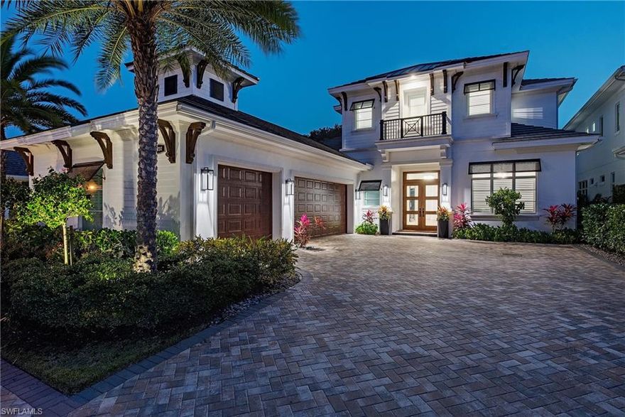 Experience refined coastal living in this exceptional Naples residence, residing within a newer, smaller, private, gated, community with only 28 residences where elegance meets effortless indoor-outdoor luxury. Thoughtfully designed with an open floor plan, coffered ceilings, wide-plank white oak flooring, and expansive walls of glass, the home is bathed in natural light and showcases a seamless flow ideal for both intimate living and grand entertaining. The open-concept great room is anchored by striking designer lighting and sophisticated finishes, creating a warm yet modern ambiance. The home has Control 4 home automation as well as surround sound in the main living area as well as outdoors. A chef-inspired kitchen features custom cabinetry, Bosch appliances, an oversized island with seating, and dining area directly off the kitchen. Disappearing glass sliders open to a private tropical retreat, blending the interior with a resort-style outdoor setting. The covered lanai offers generous lounge and dining areas, while the sparkling pool and spa are surrounded by lush, mature landscaping for ultimate privacy. Evening ambiance is elevated with soft architectural lighting and serene water reflections, creating an idyllic backdrop for sunset gatherings. Upstairs and beyond, the home continues to impress with refined architectural details, a statement staircase with glass railing, and beautifully appointed spaces that reflect meticulous craftsmanship throughout. Located in the heart of Naples, this residence embodies Florida luxury offering sophistication, comfort, and the coveted indoor-outdoor lifestyle that defines Southwest Florida living. The residence is  located in close proximity to the beach and all the best Naples has to offer! Not to forget to nearby award winning private and public schools as well!