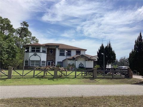 Photo of 1702 Highland AVE, LEHIGH ACRES, FL 33972 (MLS # 226015102)