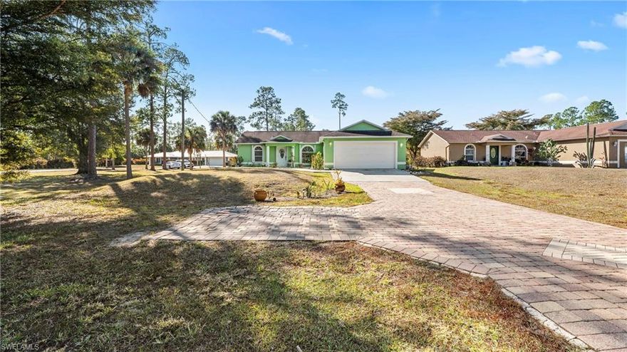 Value, value, value meets versatility in this stunningly refreshed 3-bedroom, 2-bathroom home that perfectly captures the essence of modern coastal design. Nestled on a 1.14-acre lot with full drivable access to the backyard, this property is a rare find for those seeking both space and style without the restrictions of an HOA. The interior greets you with a bright, open feel, featuring neutral coastal modern tones, durable tile flooring throughout, and a freshly painted interior anchored by a custom accent wall in the main living area. The heart of the home is fully equipped for the modern chef with brand-new stainless steel appliances, complemented by a new washer and dryer and designer light fixtures and fans that add a touch of contemporary elegance. Beyond the aesthetic updates, this home offers incredible peace of mind with a 2019 HVAC system, a new well sub-pump installed just two years ago, and manual hurricane shutters on all windows for total storm protection. Outdoor enthusiasts and hobbyists will appreciate the massive backyard and the handy 10x15 metal shed that comes fully wired for power, making it the perfect workshop or storage hub. This home offers incredible value and an unparalleled lifestyle of comfort and freedom at this price point.