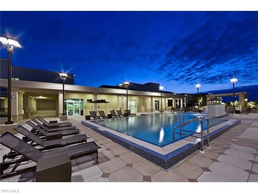 MOTIVATED SELLER!  This unit was the two bedroom model and has only been lived in part time for a few years!  Located on the top floor (5th) floor is this beautifully furnished two bedroom, two bathroom.  Master bath has large soaking tub with extended shower.  Rich hard wood floors in the main, dining, kitchen and hall.  Custom built in closets.  Extra large balcony with the views of Mercato main street.  Comes with two assigned parking spaces in the gated owners garage, and a storage unit just across the hall.  Walk downstairs to restaurants, shops, a twelve screen movie theatre, too many more to mention.  Just one mile to Vanderbilt Beach where the water is perfect!