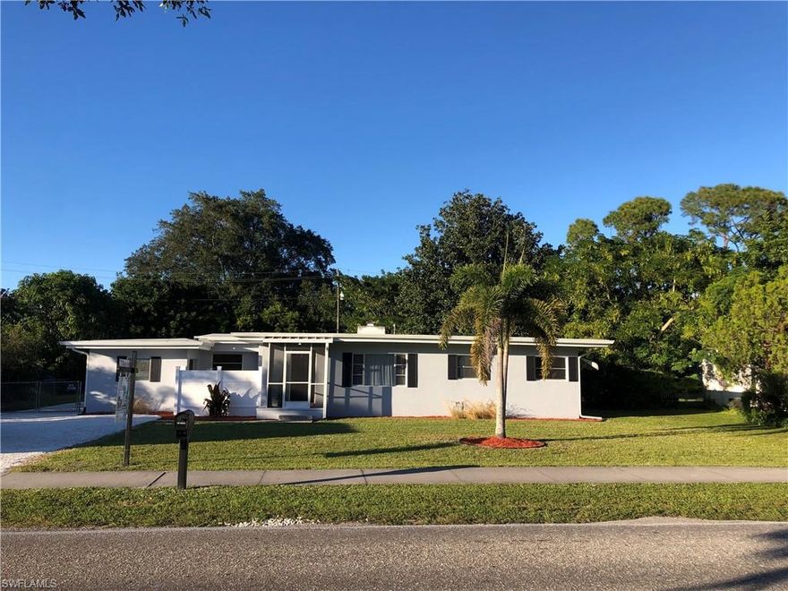 This 4 bedroom, 2 bath home is located on .4 acres and features a huge fenced yard with tons of gorgeous mature trees.   You can take advantage of the beautiful Florida weather on your private screened lanai.  The home has been updated recently and is move in ready.  Some features include a new kitchen, new plumbing throughout, updated floors, a fireplace and a 2 year old roof.  The home is centrally located, and is in the County so there are NO City taxes.  There is a HUGE outbuilding for additional storage, workshop, etc., and loads of additional storage space in the home as well as plenty of parking in the extra long extra wide driveway.  Located 1 block from Fort Myers Country Club (no golf membership required), the community pool and  tennis courts.  Make your appointment today!